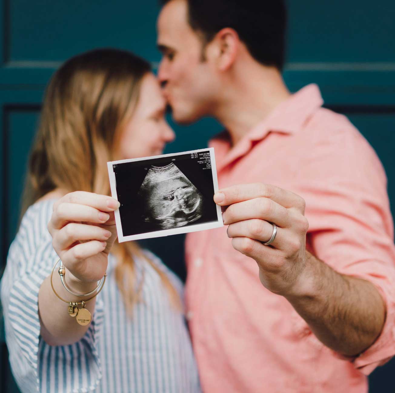 Parents Holding Ultrasound Photo