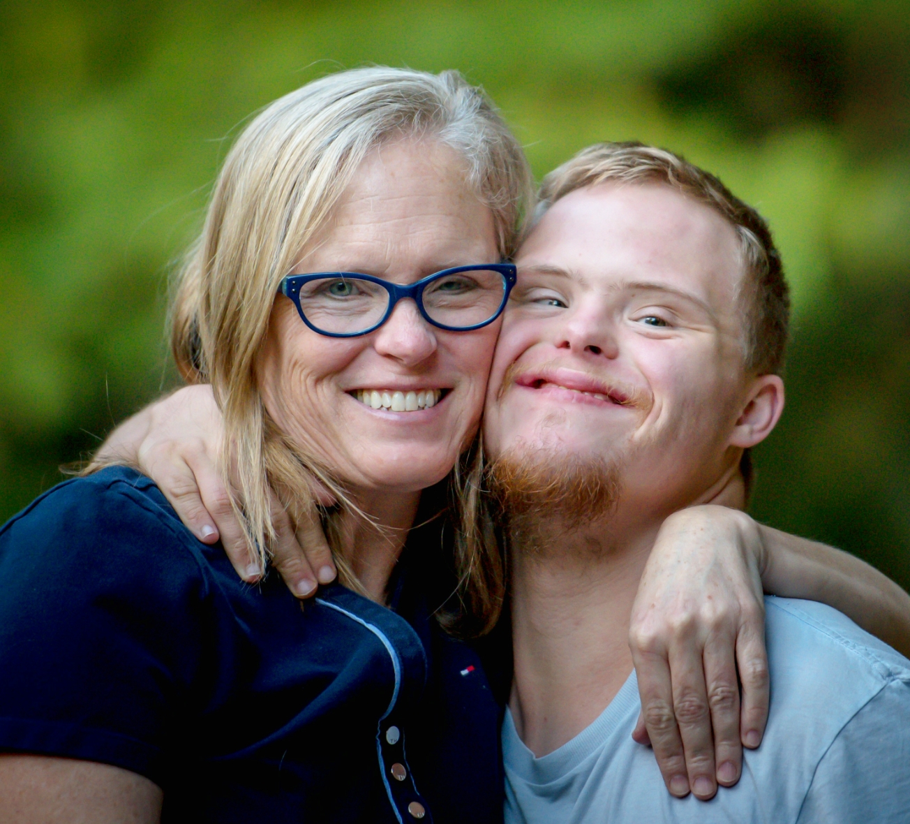 Mother Hugging Adult Son
