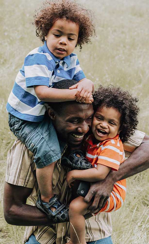 Father And Two Young Children