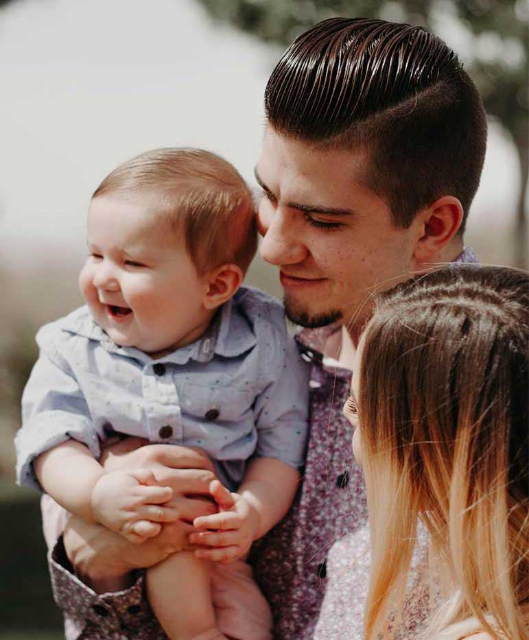 Young Parents With Baby