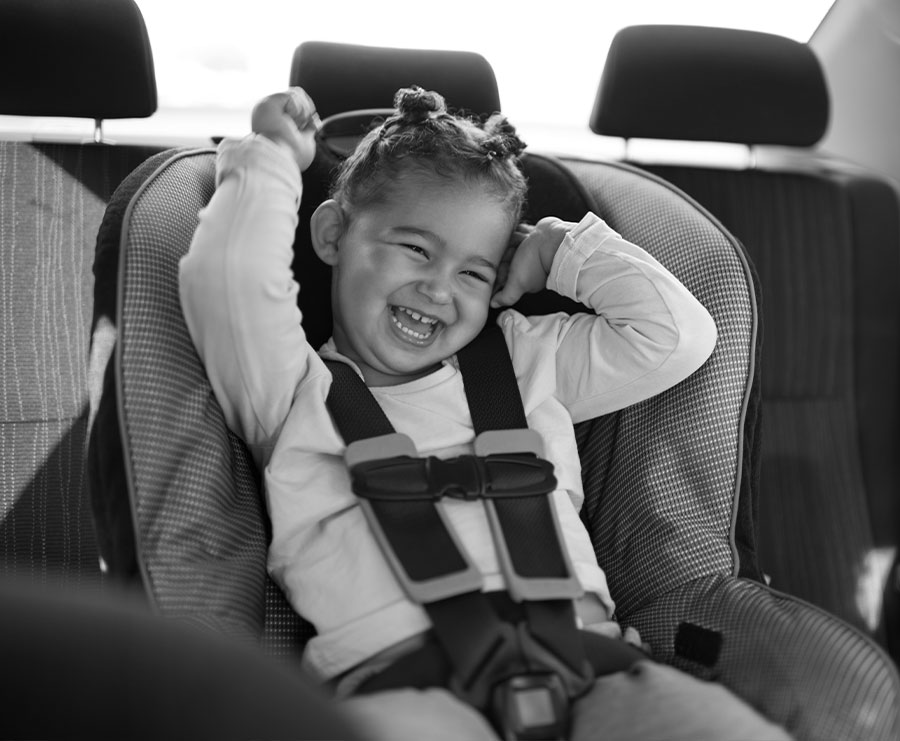 Young Girl In Car Seat