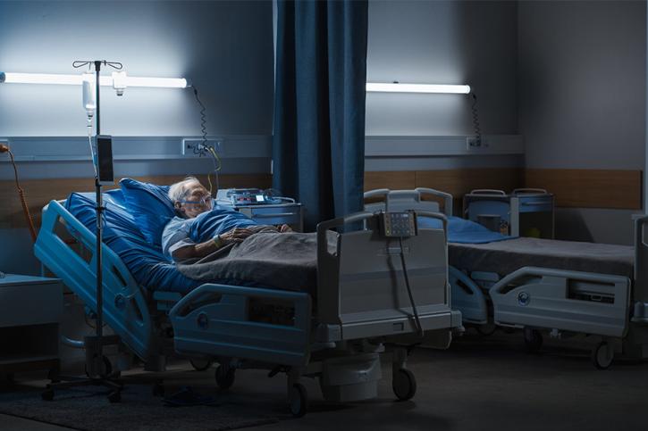 Elderly Patient in Hospital Bed